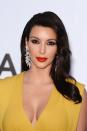 <p>2012 is when Kim and Kanye started dating and it also marks the start of Kim's style revolution. </p><p>This look was a step up in terms of the glam looks we'd seen on her before and elevated Kim to a whole new level. Side note, we wish she would wear a red lip more often.</p>