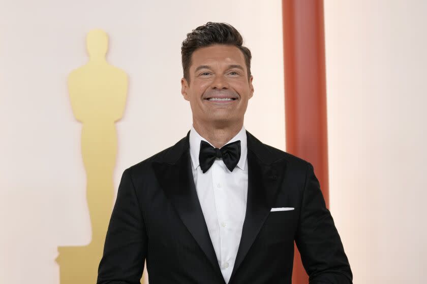 Ryan Seacrest arrives at the Oscars