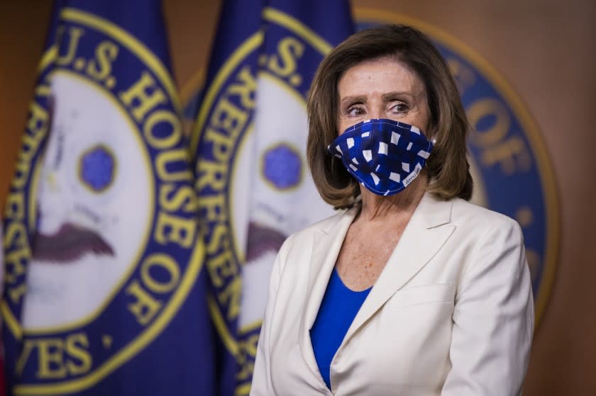 House Speaker Nancy Pelosi of Calif. listens to questions during a news conference on Capitol Hill Thursday, April 30, 2020, in Washington. (AP Photo/Manuel Balce Ceneta)