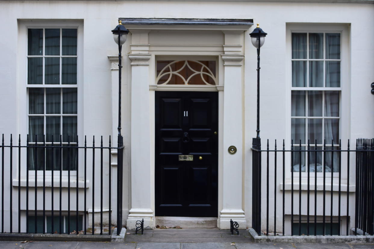 The closed door of number 11 Downing Street, London, the official residence of the Chancellor of the Exchequor, ahead of Chancellor Philip Hammond delivering his Budget to the House of Commons this afternoon.