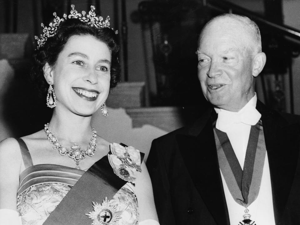 ueen Elizabeth II with US president Dwight D Eisenhower at a White House State banquet in 1957.