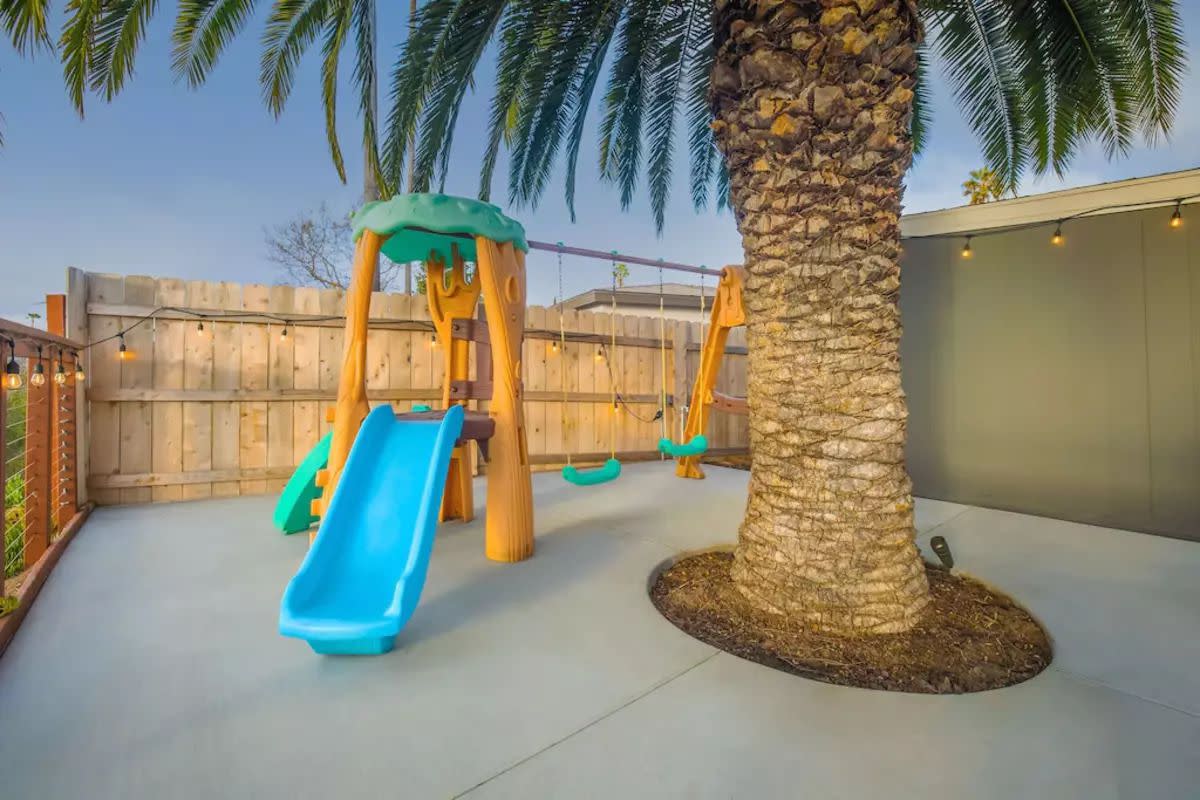 Swing Set and Slide on Outdoor Patio, Kids Paradise, San Diego