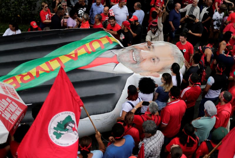 An inflated effigy of former Brazilian President Luiz Inacio Lula da Silva is displayed as supporters wait for his arrival after he was released from prison, in Sao Bernardo do Campo