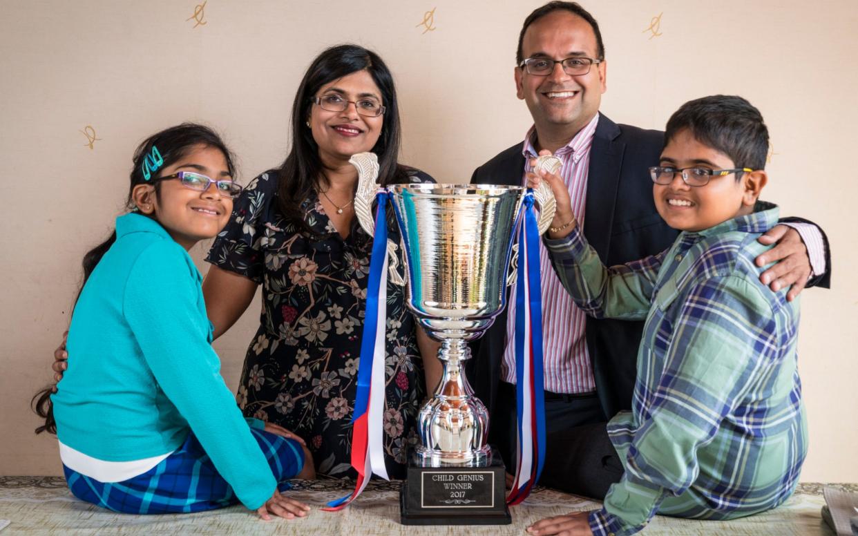 Rahul Doshi, the 12-year-old winner of Child Genius 2017, pictured with his mother Komal, father Minesh and sister, Ria - Andrew Crowley