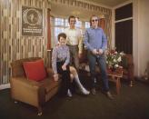 <p>Elton John with his mother, Sheila Eileen Dwight, and stepfather, Fred Fairebrother, at their apartment in London in 1971.</p>