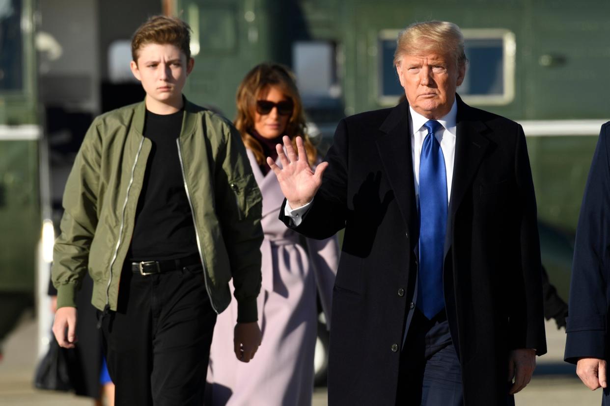 Donald Trump with first lady Melania and their son Barron at Andrews Air Force base in Maryland on their way to Mar-a-Lago in Florida: AP