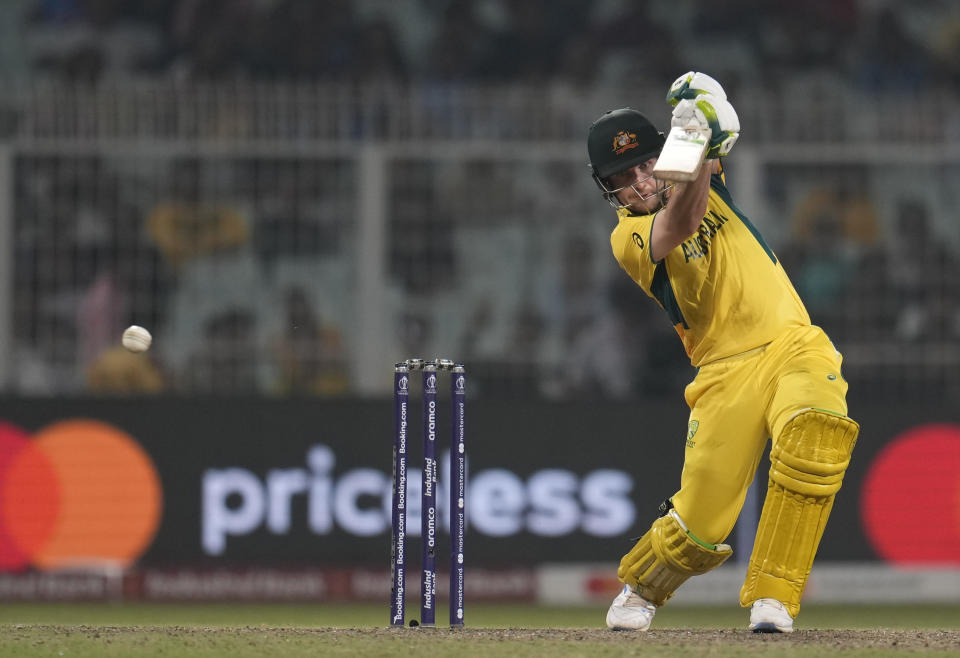 Australia's wicketkeeper Josh Inglis plays a shot during the ICC Men's Cricket World Cup second semifinal match between Australia and South Africa in Kolkata, India, Thursday, Nov.16, 2023. (AP Photo/Aijaz Rahi)