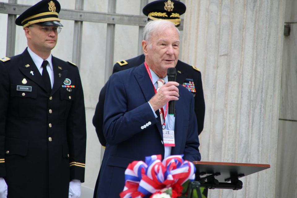 Dr. Warren G. Harding III addresses the crowd that gathered Saturday for the annual wreath-laying ceremony in memory of President Warren G. Harding and his wife, Florence Harding, at the Harding Memorial in Marion. Dr. Harding is a grandnephew of President Harding.