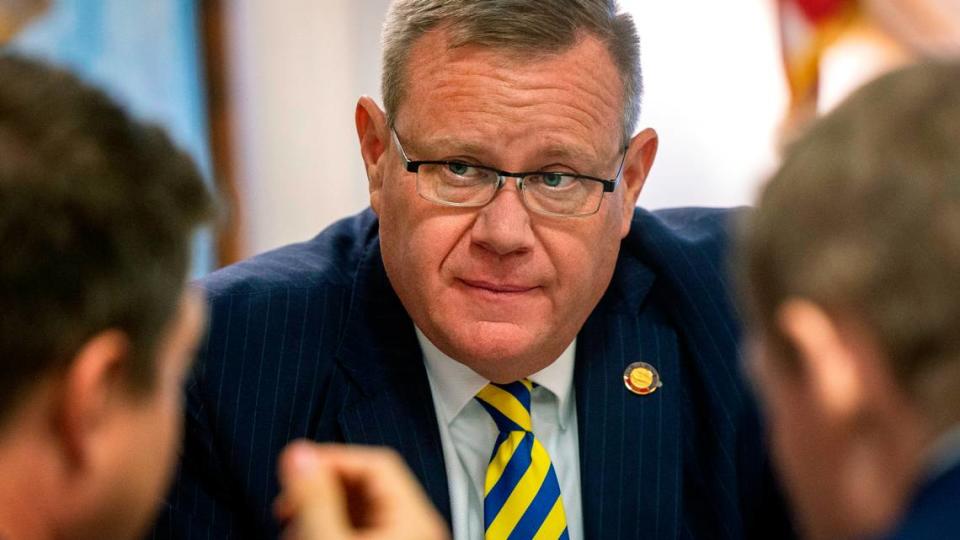 House Speaker Tim Moore, center, confers with his chief of staff, Neal Inman, left, and Rep. Destin Hall, a Caldwell and Watauga County Republican, Thursday, Sept. 21, 2023, prior to the first of several votes on the budget at the General Assembly.