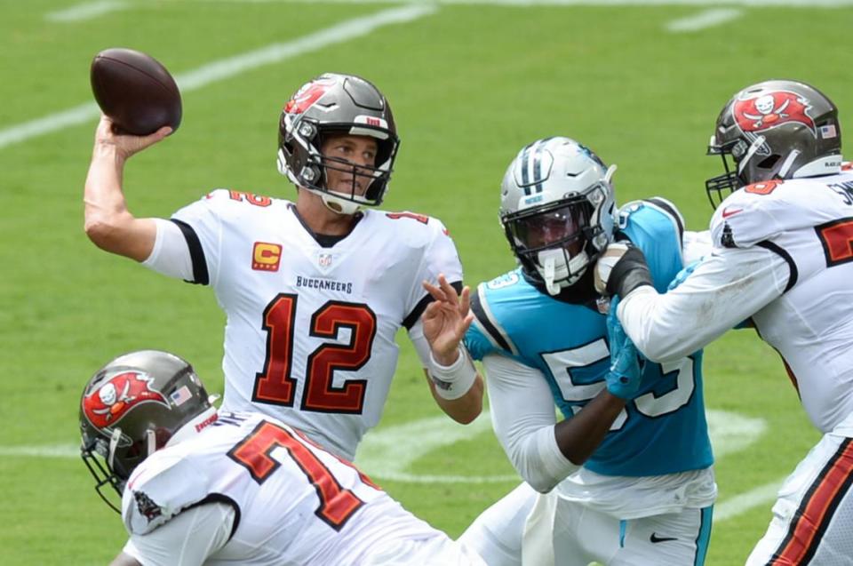 Tampa Bay Buccaneers quarterback Tom Brady (12) throws against the Carolina Panthers in September. The Buccaneers beat Carolina by 14 and 23 points in 2020.