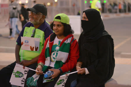 A Saudi family arrives to watch the soccer match between Al-Ahli against Al-Batin at the King Abdullah Sports City in Jeddah, Saudi Arabia January 12, 2018. REUTERS/Reem Baeshen