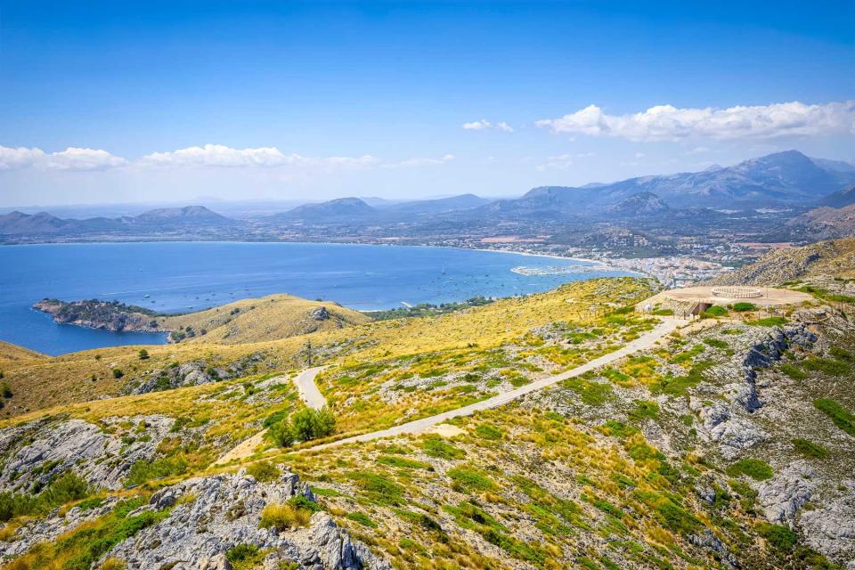 Serra de Tramuntana mountains and town and bay Port de Pollença on the Spanish Balearic island of Majorca