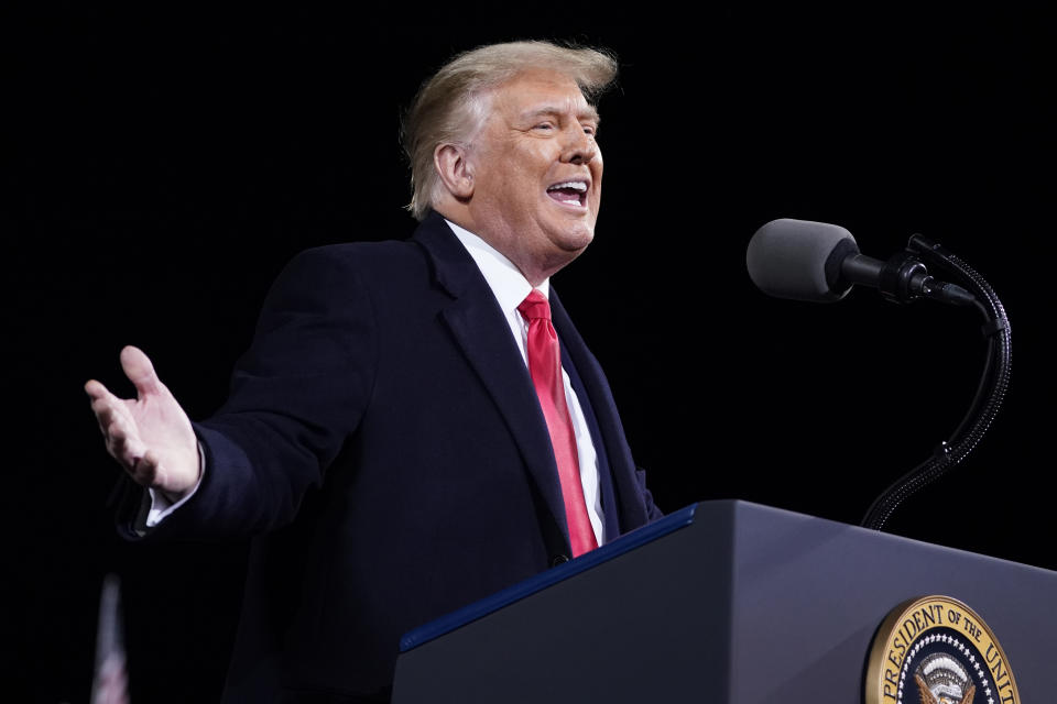 President Donald Trump speaks at a campaign rally for Senate Republican candidates, Sen. Kelly Loeffler, R-Ga., and Sen. David Perdue, R-Ga., at Valdosta Regional Airport, Saturday, Dec. 5, 2020, in Valdosta, Ga. (AP Photo/Evan Vucci)