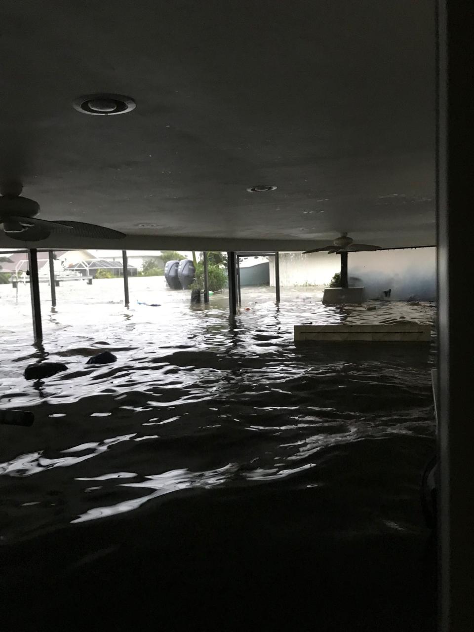Southwest Florida residents Peggy and Bruce Zachritz tied themselves to the front porch during Hurricane Ian as water rushed into their south Fort Myers home.