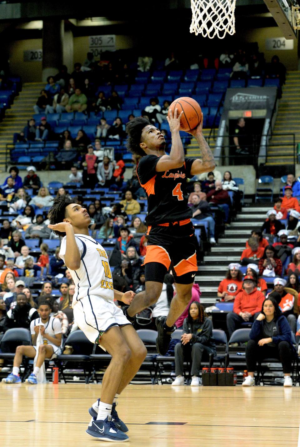 Lanphier's Jaiquan Holman goes up for a shot during the City Tournament final Saturday, January 20, 2024.