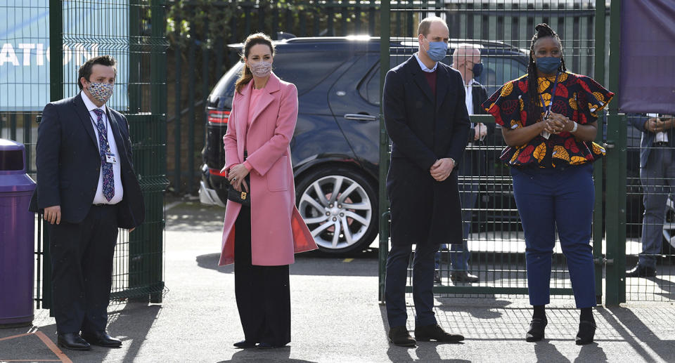 Britain's Prince William and Kate, Duchess of Cambridge arrive for a visit to School21, a secondary schools in east London, Thursday March 11, 2021. Prince William has defended Britainâ€™s monarchy against accusations of bigotry made by his brother, Prince Harry, and his sister-in-law, Meghan, insisting the family is not racist. In comments made during a visit Thursday to an east London school, William became the first royal to directly address the explosive interview his brother and Meghan gave to Oprah Winfrey. Buckingham Palace sought to respond to Harry and Meghanâ€™s allegations of racism and mistreatment in a 61-word statement, but it has failed to quell the controversy. (Justin Tallis/Pool via AP)