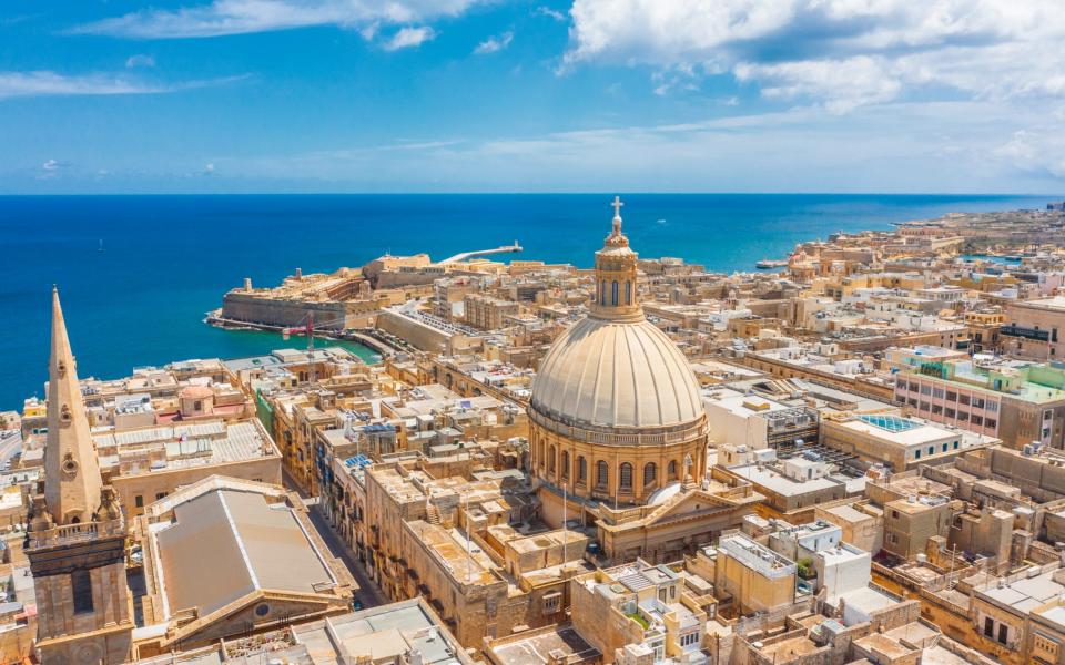 Aerial view of Lady of Mount Carmel church, St.Paul's Cathedral in Valletta city, Malta - Getty