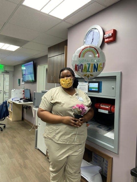 Pershay Smack is a Dwyer scholar who has become a certified nursing assistant. Dwyer Workforce Development provides case management as well as flowers periodically to its scholars.