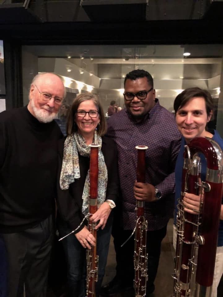 Anthony Parnther, third from left, with composer John Williams, left, and bassoonists Rose Corrigan and Damian Montano.