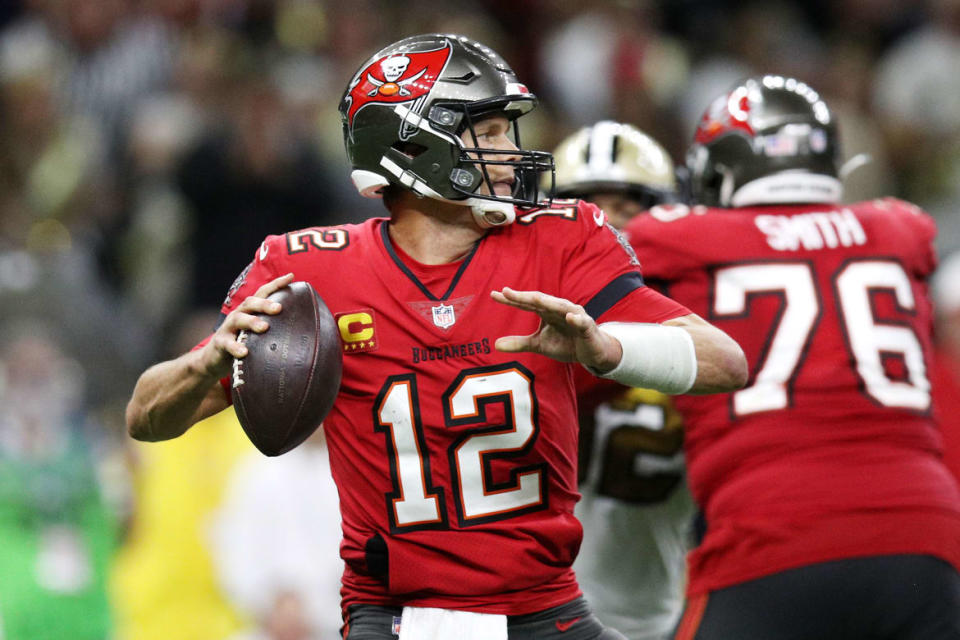 <div class="inline-image__caption"><p>Tom Brady #12 of the Tampa Bay Buccaneers looks to throw the ball during the fourth quarter against the New Orleans Saints at Caesars Superdome on Oct. 31, 2021, in New Orleans, Louisiana. </p></div> <div class="inline-image__credit">Sean Gardner/Getty</div>