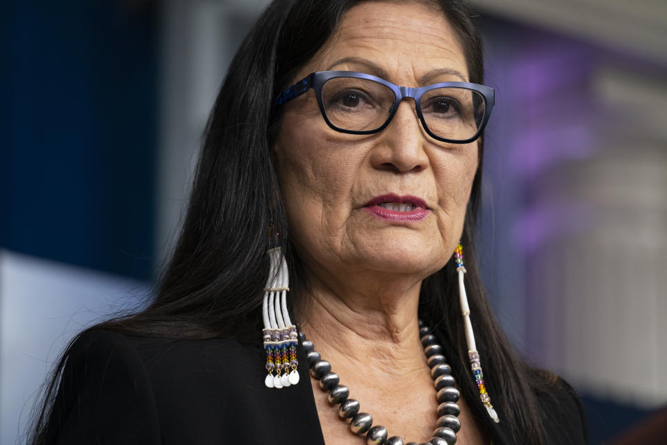 FILE - In this April 23, 2021, file photo, Interior Secretary Deb Haaland speaks during a news briefing at the White House in Washington. Haaland has made her recommendation about whether to reverse President Donald Trump's decision to downsize two sprawling national monuments in Utah, but details on her decision were not released. A court filing Thursday, June 3, in a legal battle that began more than three years ago shows the Interior Department gave the report to President Biden on Wednesday.(AP Photo/Evan Vucci, File)