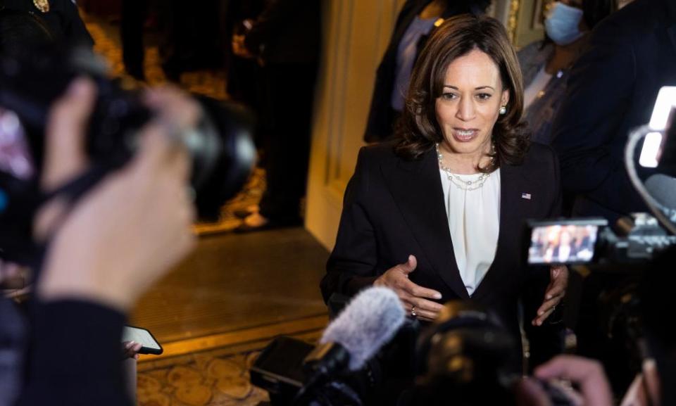 Kamala Harris speaks to reporters outside the Senate chamber.