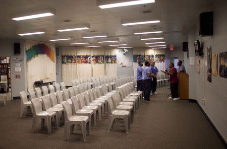 Inmates worship during a media tour of the Curran-Fromhold Correctional Facility in Philadelphia, Pennsylvania, August 7, 2015. REUTERS/Mark Makela