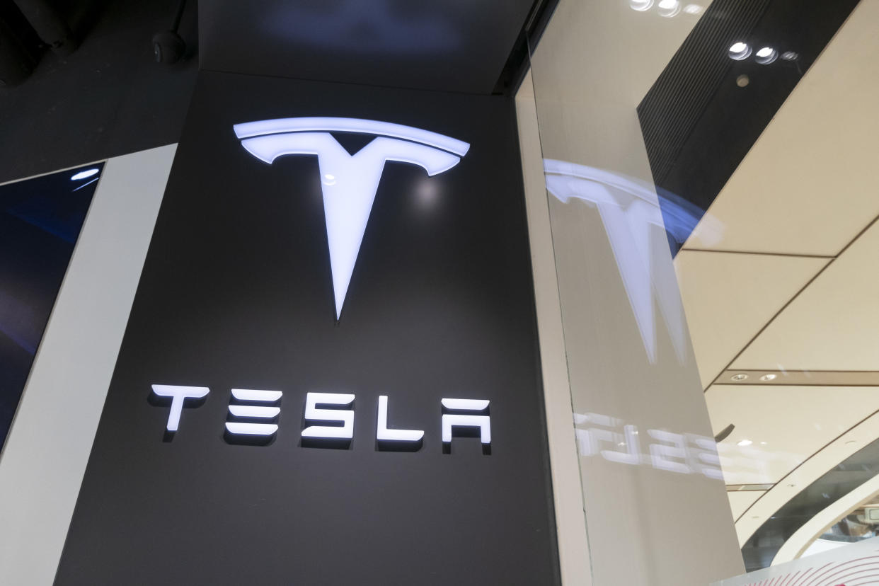 SHANGHAI, CHINA - AUGUST 11: Tesla logo is seen at the Tesla experience store on August 11, 2020 in Shanghai, China. (Photo by Wang Gang/VCG via Getty Images)