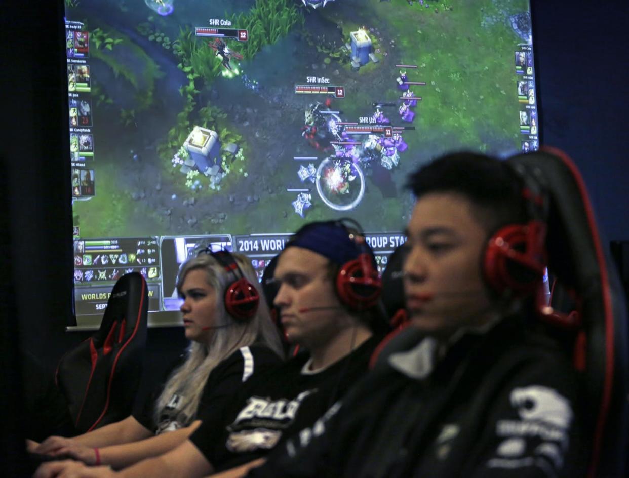 <span class="caption">College videogame team members practice League of Legends.</span> <span class="attribution"><a class="link " href="https://newsroom.ap.org/detail/LeagueofLegendsEsports101/82e5316f00e046da906c96a16d9f07d7/photo?Query=League%20of%20legends&mediaType=photo&sortBy=&dateRange=Anytime&totalCount=225&currentItemNo=13" rel="nofollow noopener" target="_blank" data-ylk="slk:AP Photo/M. Spencer Green;elm:context_link;itc:0;sec:content-canvas">AP Photo/M. Spencer Green</a></span>