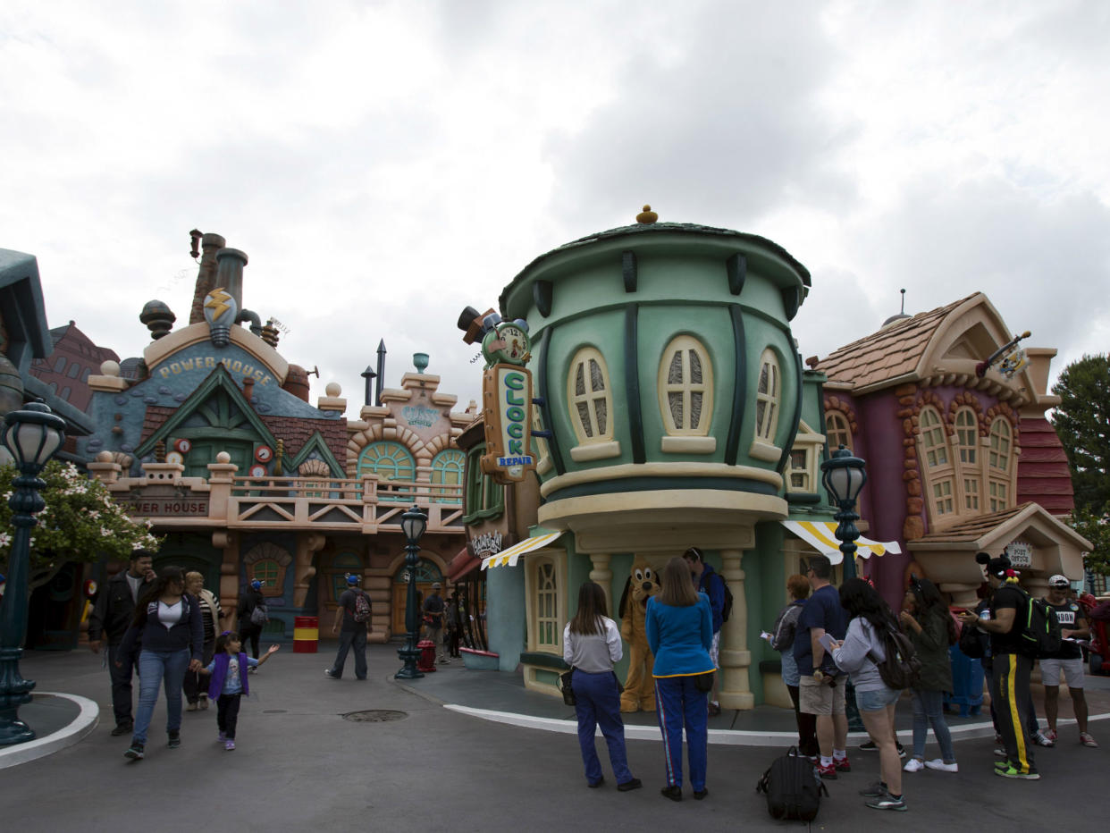 People walk through Mickey's Toontown, one of the areas affected by a power outage at Disneyland: REUTERS/Mario Anzuoni