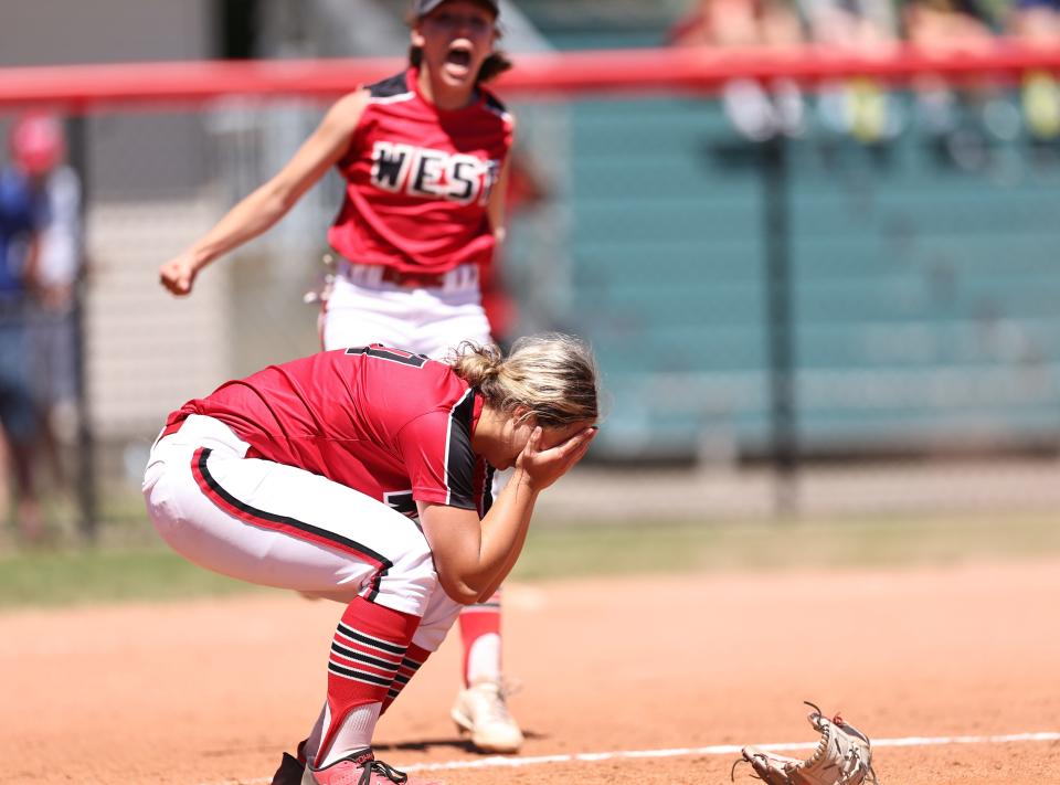 Lakota West pitcher K.K. Mathis celebrates after the Firebirds won the Division I state softball championship at Firestone Park in Akron, Saturday, June 4, 2022.