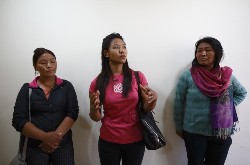 Dawa Yangzum Sherpa, along with other family members of Dawa Tashi Sherpa, speaks with media personnel at Grandi International Hospital in Kathmandu