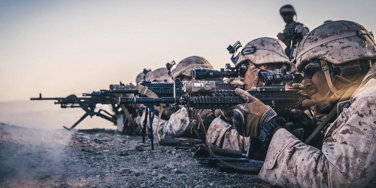 Marines and sailors with Kilo Company, Battalion Landing Team 3rd Battalion, 5th Marine Regiment, 11th Marine Expeditionary Unit, conduct a live fire range during a pre-deployment training exercise at MAGTF Training Command/Marine Corps Air Ground Combat Center at 29 Palms, California, Nov. 11, 2018.