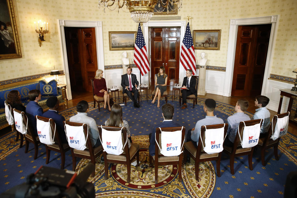 First lady Melania Trump, second from right, attends a listening session with teenagers about their experiences with electronic cigarettes and vaping in the Blue Room of the White House, Wednesday, Oct. 9, 2019, in Washington. Seated with Trump are counselor to the President Kellyanne Conway, from left, Health and Human Services Secretary Alex Azar and Eric Asche with the Truth Initiative. (AP Photo/Patrick Semansky)