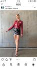 <p>Lipa wore a matching Courrèges jacket and mini skirt with some sky-high heels. </p><p><a class="link " href="https://www.courreges.com/" rel="nofollow noopener" target="_blank" data-ylk="slk:SHOP COURRÈGES NOW;elm:context_link;itc:0;sec:content-canvas">SHOP COURRÈGES NOW</a></p>