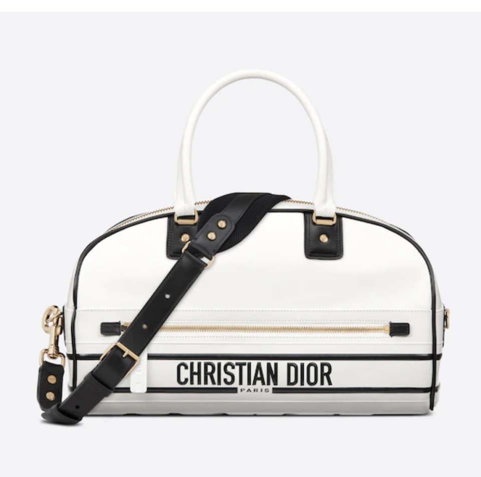 <p><strong>Dior</strong></p><p>dior.com</p><p><strong>$4700.00</strong></p><p><a href="https://go.redirectingat.com?id=74968X1596630&url=https%3A%2F%2Fwww.dior.com%2Fen_us%2Fproducts%2Fcouture-M6202OOBR_M879-medium-dior-vibe-zip-bowling-bag-white-smooth-calfskin&sref=https%3A%2F%2Fwww.harpersbazaar.com%2Ffashion%2Ftrends%2Fg37664800%2Fspring-2022-handbag-trends%2F" rel="nofollow noopener" target="_blank" data-ylk="slk:Shop Now;elm:context_link;itc:0;sec:content-canvas" class="link ">Shop Now</a></p><p>The bowling bag is back and even better by Dior.</p>