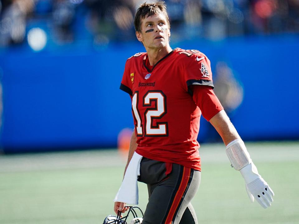 Tom Brady looks up after a play against the Carolina Panthers.