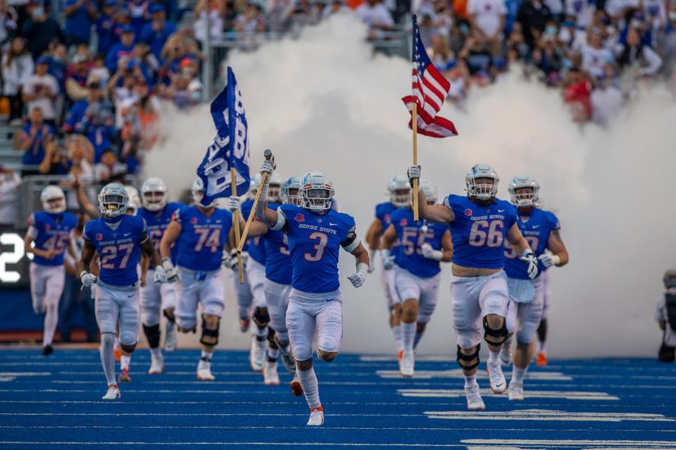 Boise State Broncos bring the American flag onto the field prior to the game against the UTEP Miners at Albertsons Stadium on Sept. 10.