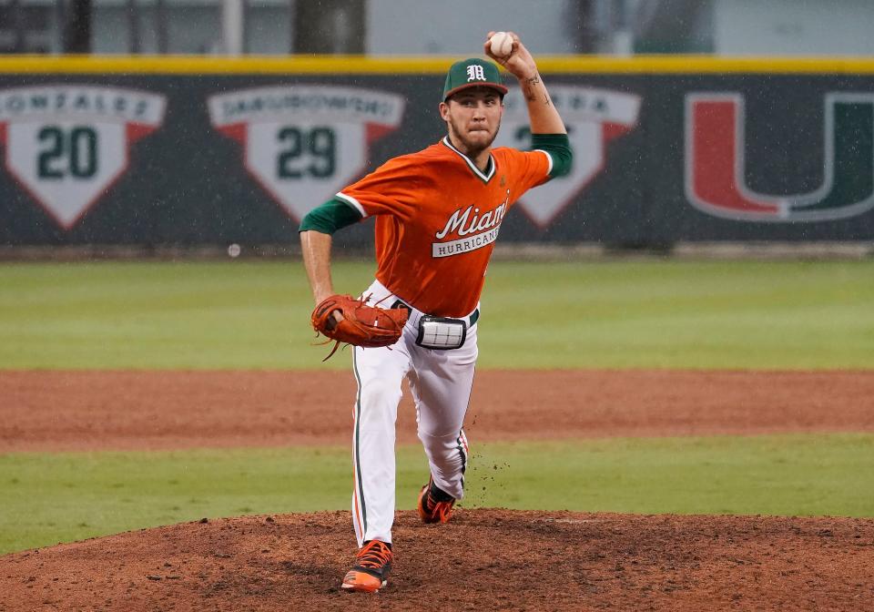 CORAL GABLES, FL - FEBRUARY 26: Miami left handed pitcher Carson Palmquist (14) pitches during a college baseball game between the University of South Florida and the University of Miami Hurricanes on February 26, 2020 at Alex Rodriguez Park at Mark Light Field, Coral Gables, Florida. Miami defeated South Florida 7-5. 