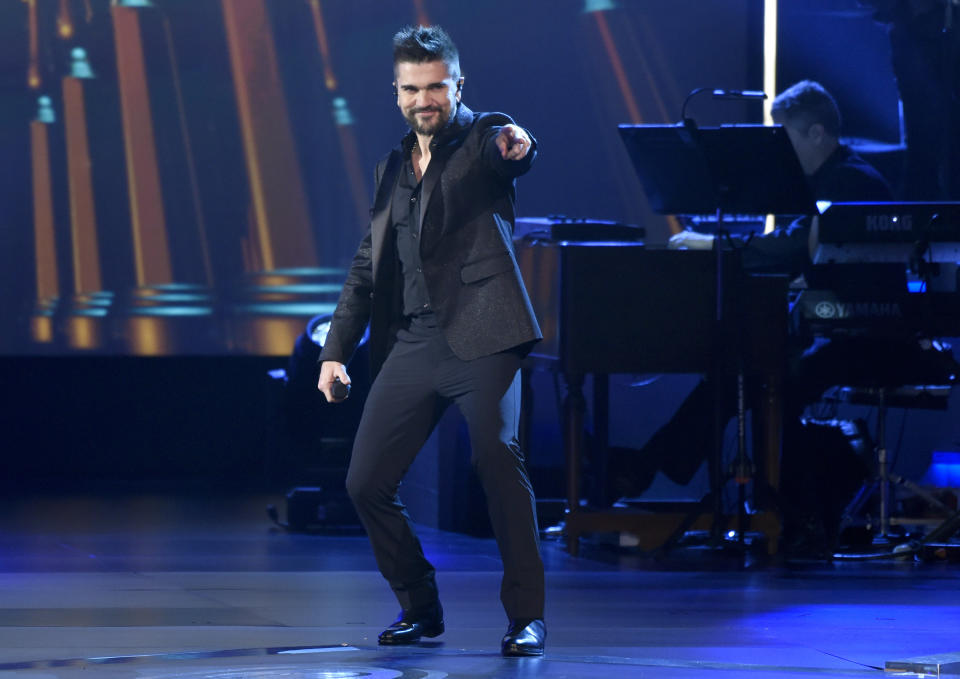 FILE - Juanes performs "Quisiera Ser" at the Latin Recording Academy Person of the Year tribute honoring Alejandro Sanz on Nov. 15, 2017, in Las Vegas. Juanes turns 48 on Aug. 9. (Photo by Chris Pizzello/Invision/AP, File)