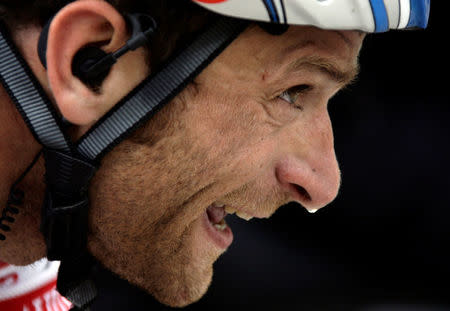 FILE PHOTO: Italy's Michele Scarponi climbs during the 248-km sixth stage of the Giro d'Italia cycling race, from Bressanone to Mayrhofen im Zillertal, May 14, 2009. Scarponi won the stage while compatriot Danilo Di Luca retained the leader's pink jersey. REUTERS/Stefano Rellandini/File Photo