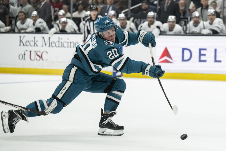 San Jose Sharks left wing Fabian Zetterlund (20) shoots for a goal during the first period of the team's NHL hockey game against the Los Angeles Kings, Wednesday, Dec. 27, 2023, in Los Angeles. (AP Photo/Kyusung Gong)