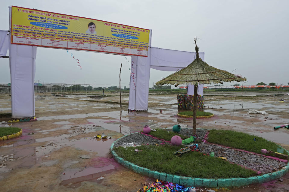 Rain puddles are seen at the scene of a fatal stampede, in Fulrai village of Hathras district about 350 kilometers (220 miles) southwest of the state capital, Lucknow, India, Wednesday, July 3, 2024. Thousands of people at a religious gathering rushed to leave a makeshift tent, setting off a stampede Tuesday that killed more than hundred people and injured scores. (AP Photo/Rajesh Kumar Singh)