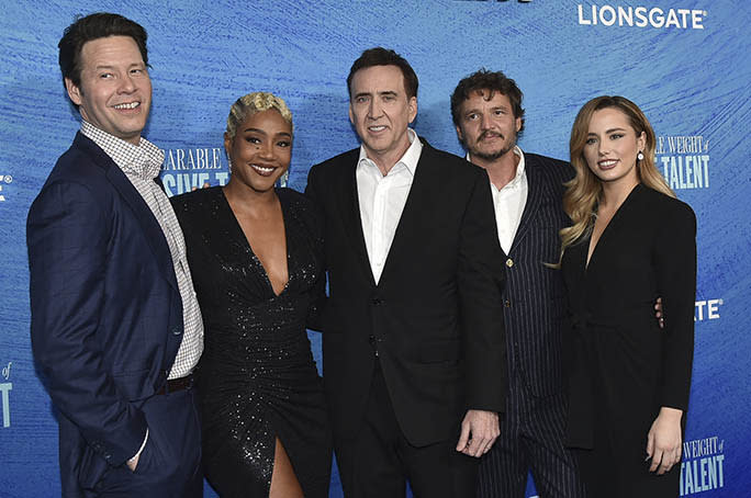 From (L-R) Ike Barinholtz, Tiffany Haddish, Nicolas Cage, Pedro Pascal, and Lily Mo Sheen at the premiere of “The Unbearable Weight of Massive Talent” in Los Angeles on April 18, 2022. - Credit: Richard Shotwell/Invision/AP