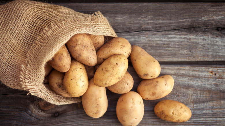 burlap sack of russet potatoes