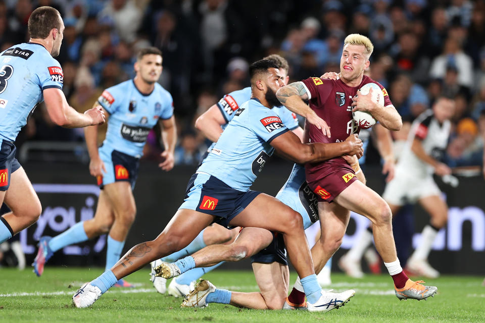 Cameron Munster, pictured here in action for the the Maroons in State of Origin I.