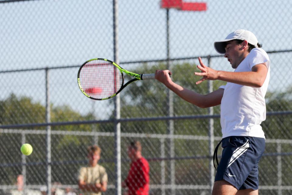 Harrison's Isaac Flanery hits the ball during an IHSAA sectional championship tennis singles match, Friday, Oct. 1, 2021 in West Lafayette.