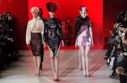 Models present creations by Portuguese designer Fatima Lopes during the Fall/Winter 2012-2013 ready-to-wear collection show in Paris