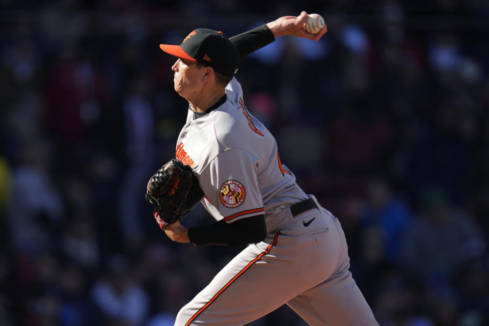 Baltimore Orioles starting pitcher Kyle Gibson delivers during the fifth inning of an opening day baseball game against the Boston Red Sox at Fenway Park, Thursday, March 30, 2023, in Boston. (AP Photo/Charles Krupa)