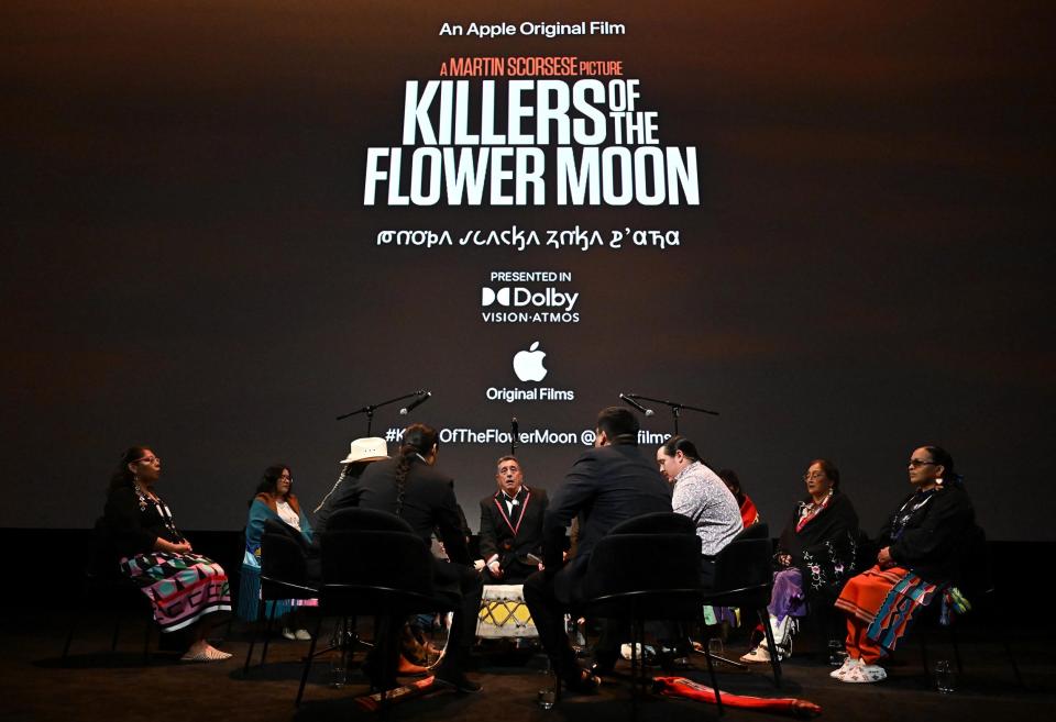 Members of the Osage Nation delegation sing around a drum at the Oct. 16 Los Angeles premiere of Apple Original Films' "Killers of the Flower Moon."